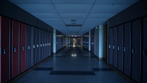 Dark highschool hallway full of lockers gimbal stabilized walkthrough.