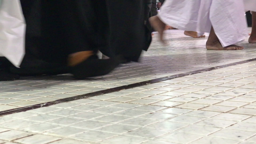 Muslim pilgrims perform saei (brisk walking) from Safa mount to Marwah mount in Makkah. Muslim pilgrims perform 7 rounds of saei from Safa mount to Marwah mount. Royalty-Free Stock Footage #1032020081
