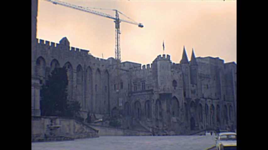 Palais des Papes in Place du Palais square. Palace of the Popes, archival of Avignon town of France in 1970s.