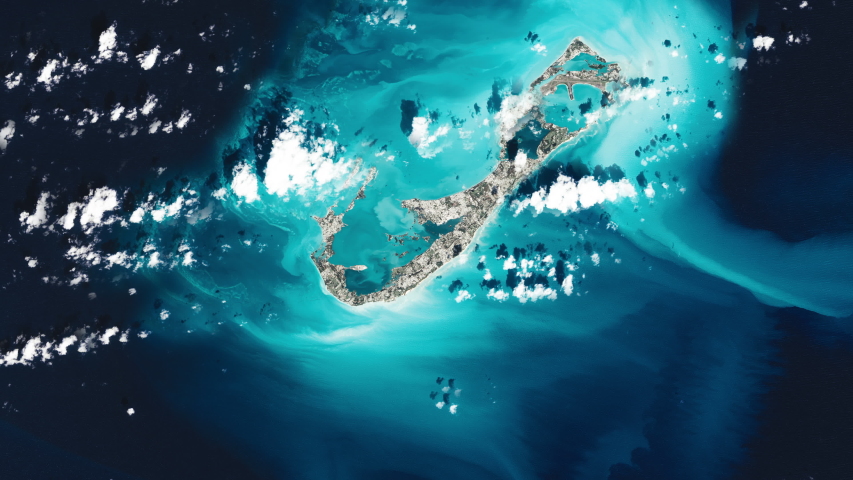 Satellite view aerial scenic ladscape of island in blue ocean, Bermuda archpelago islands. Contains public domain image by Nasa