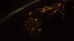 ISS Planet Earth seen from the International Space Station with Aurora Borealis over Ireland to Egypt, Time Lapse. Images courtesy of NASA. Pan up motion timelapse.
