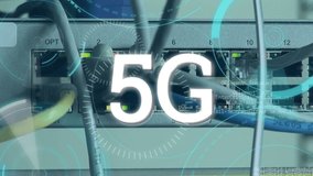 Digital animation of 5G written in the middle of a futuristic circle rotating and program codes moving in the screen. Background shows cables and wires. - Powered by Shutterstock - Get 15% off with code: PIKWIZARD15