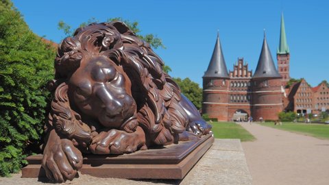 LUBECK, GERMANY- JULI 07, 2018: Architecture and lion sculpture of the Old Part of Lubeck, a city in Schleswig-Holstein, northern Germany.