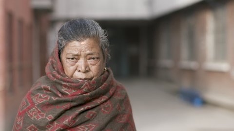 Kathmandu, Nepal - 11 27 2018: Portrait of Nepalese woman in front of Kathmandu Hospital.