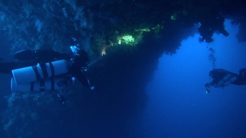 Technical divers in the Blue Hole Arch near Dahab