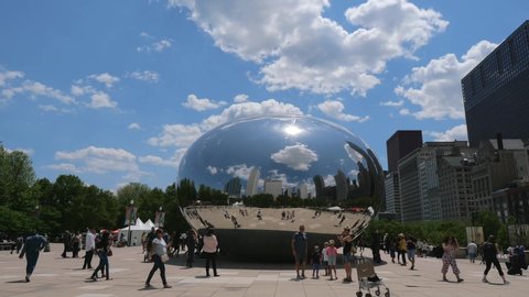 Popular landmark in Chicago - Cloud Gate at Millennium Park - CHICAGO, USA - JUNE 11, 2019