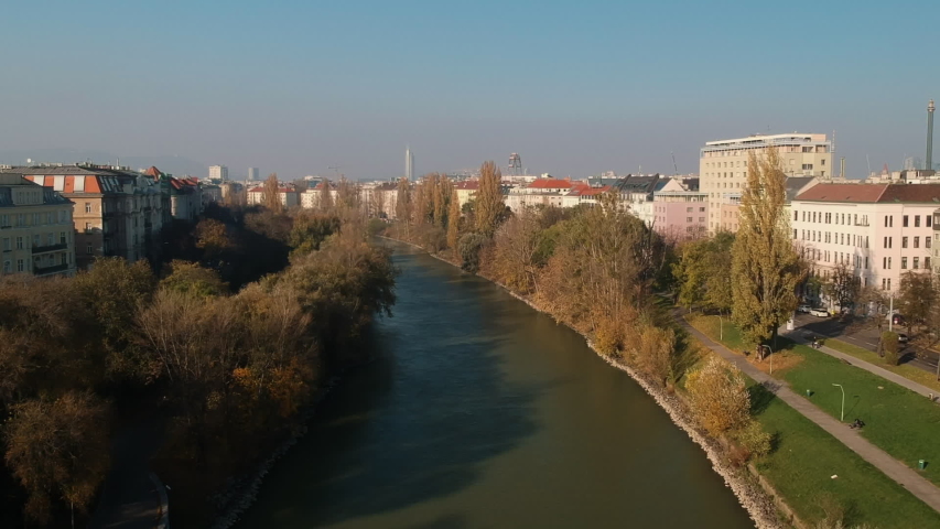 AERIAL Drone shot: flying over the Danube channel / Donaukanal in Vienna.