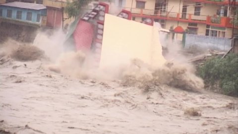 landslide, flood, cloudburst in india 2013 , killed six to seven thousand pilgrims . Three story building collapsed in Ganga river. 