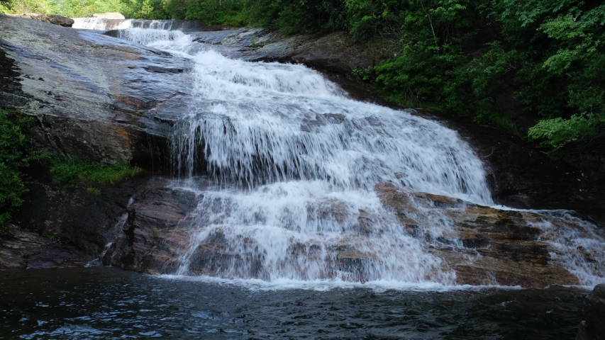 The cascades of the Lower Falls in Graveyard Fields, a very popular waterfall and hiking destination near Asheville, North Carolina in the Blue Ridge Mountains off the Blue Ridge Parkway.