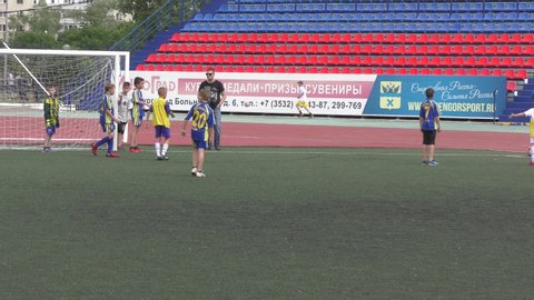 Orenburg, Russia - June 2, 2019 year: The boys play football in the preliminary games football festival "Lokobol-2019"