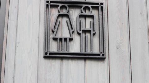 sign man woman  restroom gender