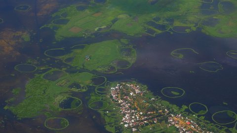 View of Imphal, surrounding area and Loktak lake in slow motion from plane window, Manipur,India.