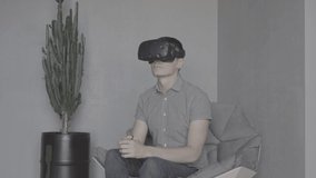 Young man using 3D VR viewer