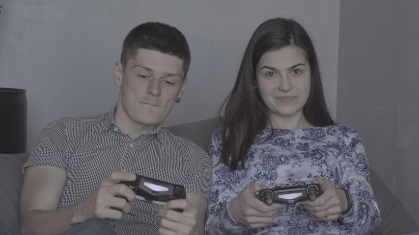 young man woman playing video games Stock Footage Video (100% Royalty ...