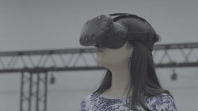 Young woman using 3D VR viewer