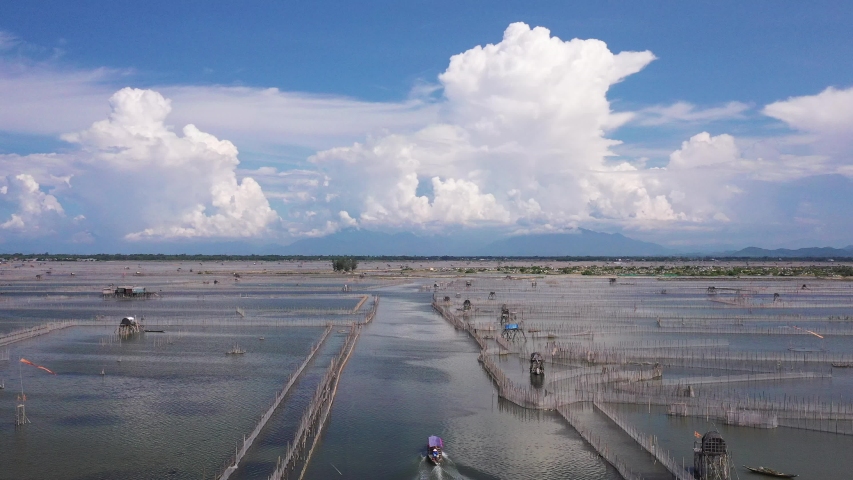 Top ariel view Chuon Lagoon on morning, Phu Vang, Hue, Vietnam.Away approximately more than 10 km from Hue city center, Chuon Lagoon is a part of Tam Giang lagoon system.