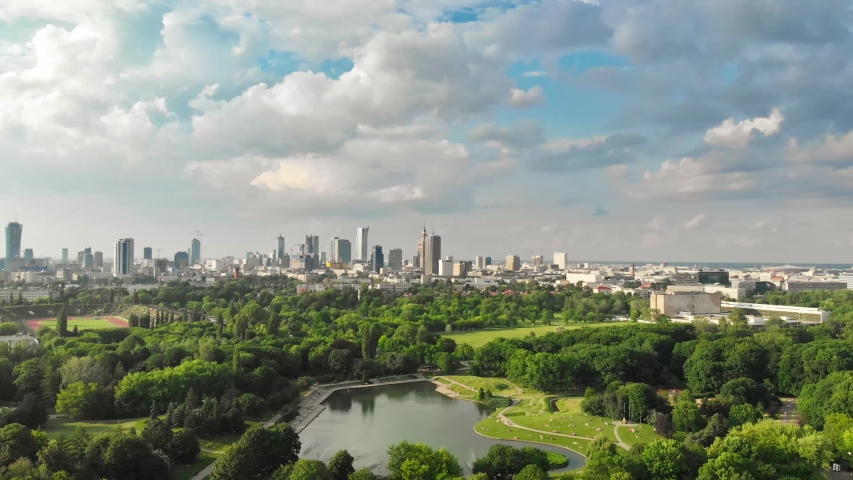 Pole Mokotowskie Warsaw Park field with lake and city aerial view Royalty-Free Stock Footage #1032187490