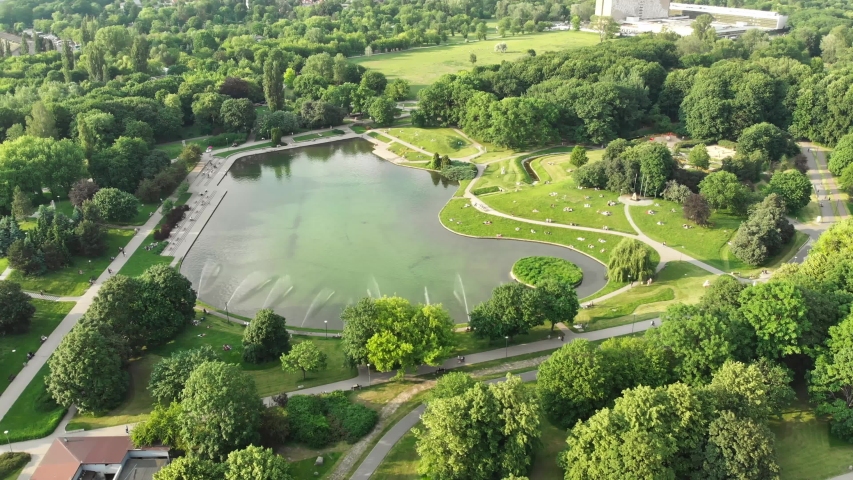 Pole Mokotowskie Warsaw Park field with lake and city aerial view Royalty-Free Stock Footage #1032187496