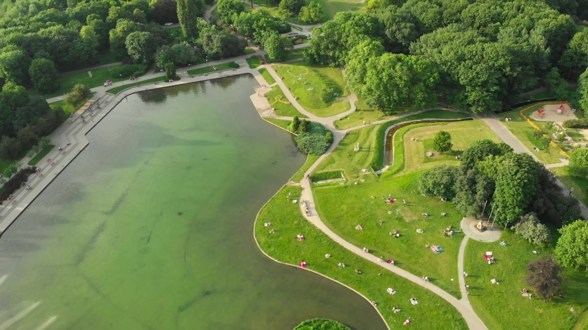 Pole Mokotowskie Warsaw Park field with lake and city aerial view Royalty-Free Stock Footage #1032187508
