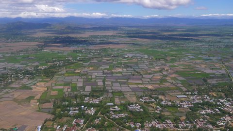 View of Imphal, surrounding area and Lok Tak lake in slow motion from plane window, Manipur,India.