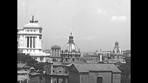 Aerial view of the churchs Santi Luca e Martina and San Lorenzo in Miranda, Altar of the Fatherland and Trajan Forum. Roman Forum in Rome city. BW historical archival of Rome capital of Italy in 1960s