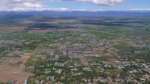 View of Imphal, surrounding area and Lok Tak lake in slow motion from plane window, Manipur,India.