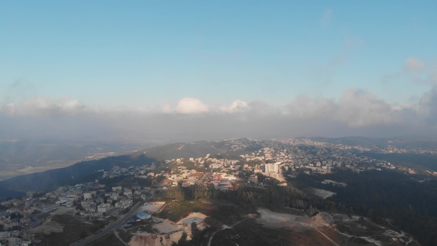 Lifting drone over Druze village Isfiya and Daliyat al-Karmel, located on the slope of Mount Carmel, Israel.