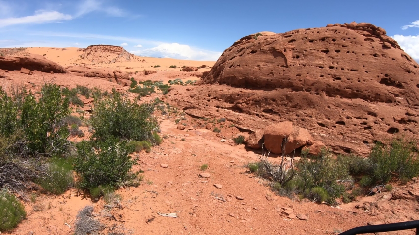 Extreme Off road red rock trail recreation Southern Utah. Southern Utah desert Sand Hollow. Red sandstone, dirt sand trails. Outdoor extreme 4x4 recreation ride and adventure. Point of view, POV.
