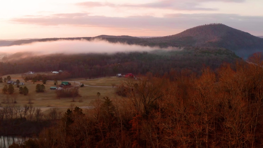 Foggy aerial sunrise in Mountainhome Arkansas.