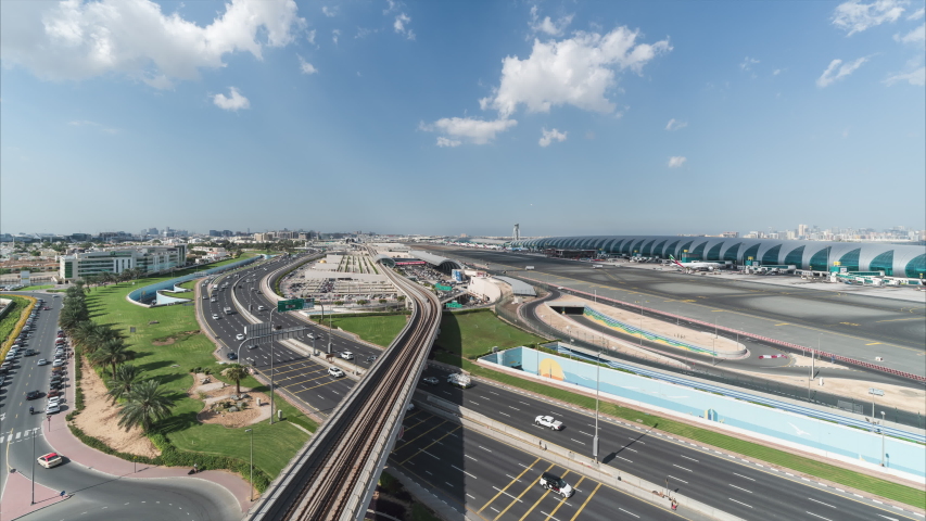 4K Time lapse - Aerial view of airport terminal in Dubai International Airport