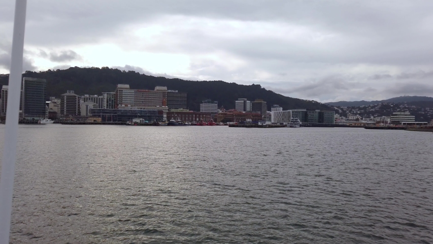 Ferry sailing through Wellington Harbor on overcast day, no people with copy space 4k