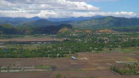 View of Imphal & surrounding area in slow motion from plane window just before landing at Bir Tikendrajit International Airport Imphal, Manipur,India.
