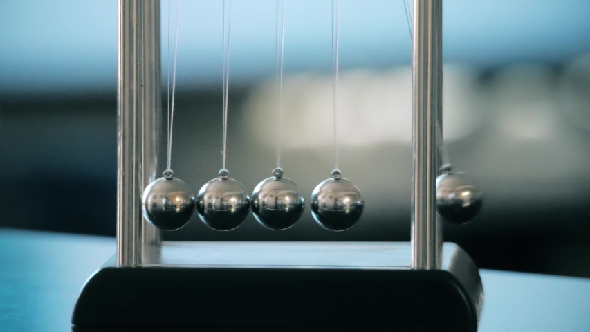 five ball pendulum