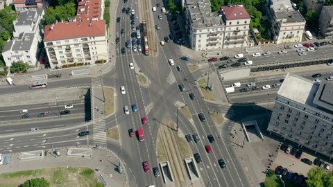 
Aerial view of warsaw / poland. Highway intersection in the city. Busy intersection in the city center. Traffic crossing busy intersection. 4K Drone shot.