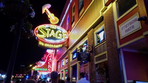 Colorful Nashville Broadway at night - a big party zone - NASHVILLE, TENNESSEE - JUNE 16, 2019
