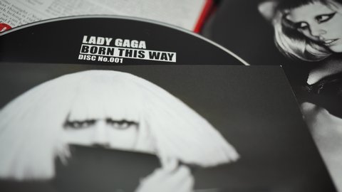 Rome, Italy - June 28, 2019:Detail of CD covers and inserts by the American singer LADY GAGA. Many call it one of the best pop performers of the 21st century