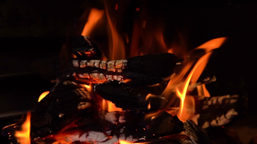 South African wood fire burning for a braai. Royalty-Free Stock Footage #1032288632