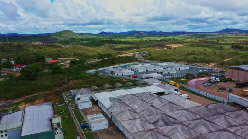 Aerial flyover shot of a refugee camp along the Brazil and Venezuela border