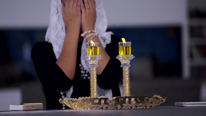jewish woman lights shabbat candles Stock Footage Video (100% Royalty ...