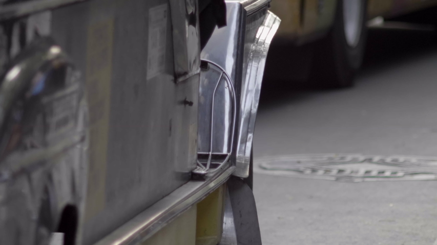 Abstract close up shop of Manila Jeepney taxi in busy traffic