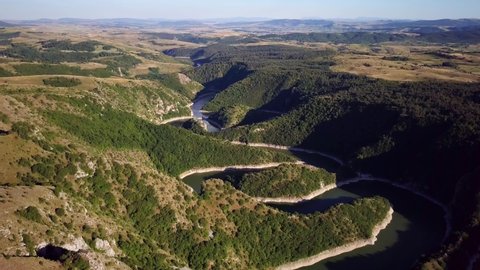 Beautiful Meanders of River Uvac, Serbia on a Sunny Summer Day Aerial View of Incredible Meanders of River Uvac and the surrounding hills, Serbia