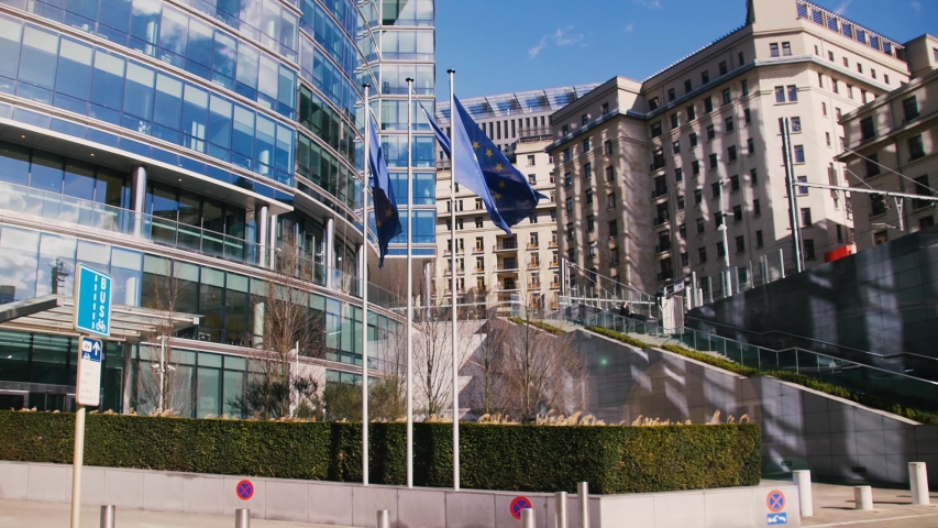 European Union building with waving European Flags (4k) | Shutterstock HD Video #1032353366