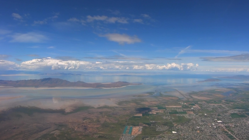 Flight Over Great Salt Lake Utah Michigan Chicago Wyoming Idaho City Canyon Mountain Wasatch Range Spring Vacation Airplane Travel Trip Colors Blue Sky Epic Clouds Cinematic Video USA 4K