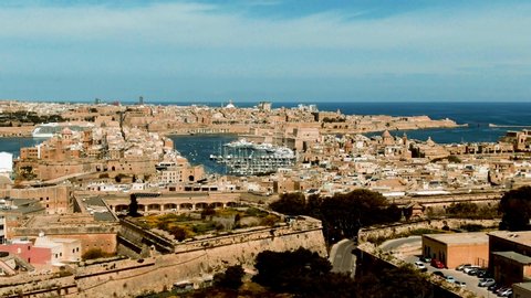 Aerial approaching view of the towns of Vittoriosa and Valletta and the entrance of the Grand Harbour in Malta