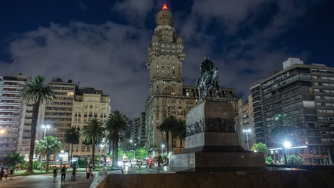 Montevideo, Uruguay - January 10, 2018: Night timelapse view of Plaza Independencia (Independence Square) showing historical landmark Artigas Mausoleum in the Old Town district of Montevideo, Uruguay.