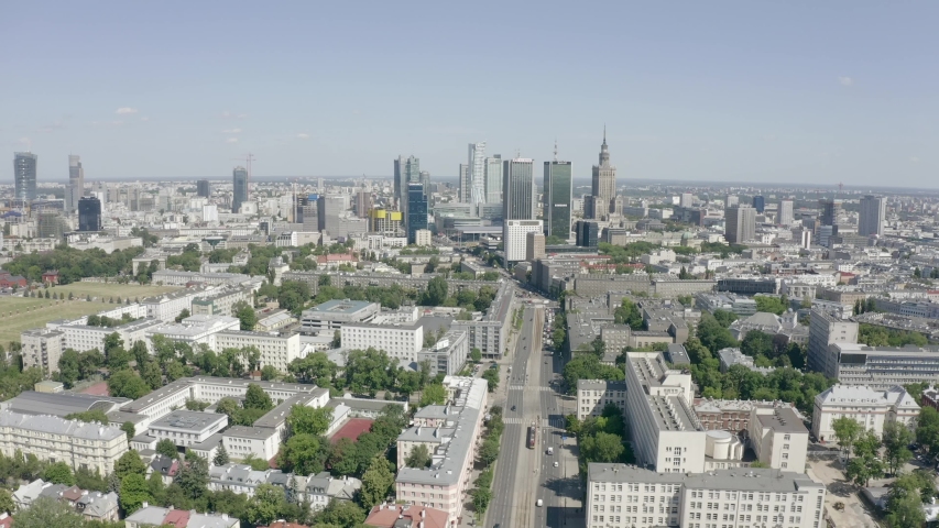 Aerial view of the Warsaw city skyline. 19. June. 2019.Top view of skyscrapers and buildings of Warsaw, Part of city Mokotovo field. Daylight horizon in summer. Wide shot. 4k shot with a drone. | Shutterstock HD Video #1032386891