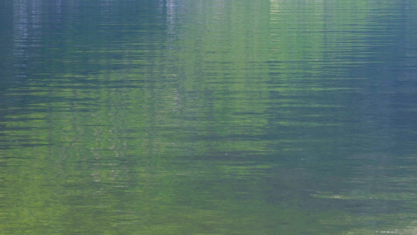 Beautiful little town of Halstatt - latest attraction for tourists from all over the world. View from the other side of the Halstatt See (lake). 