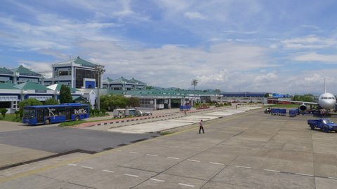 Imphal, India: June 23, 2019 :  Plane and passengers at Bir Tikendrajit International Airport, Imphal, Manipur, India.