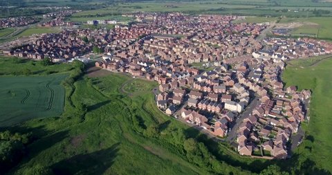 Drone video flight over English new housing estate, Aylesbury, Buckinghamshire, England, UK