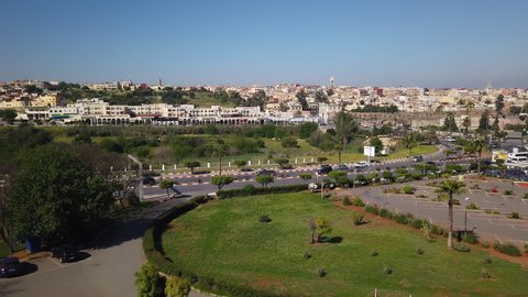 Panoramic view of the old medina town of Meknes with car traffic